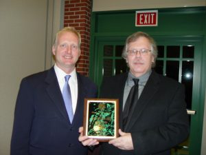 Dr. James Andrews (left) honoring SISLT professor, Dr. John Budd (right) for delivering an Alice G. Smith Lecture at the USF School of Information.