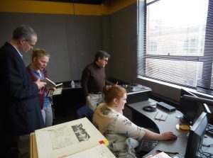 University Archivist Anselm Huelsbergen, Host Mentor Jackie Casteel, Local Mentor Jim Hone, and Spring Fellow Rebecca Benson MLIS '18 at our Digitization Station. 