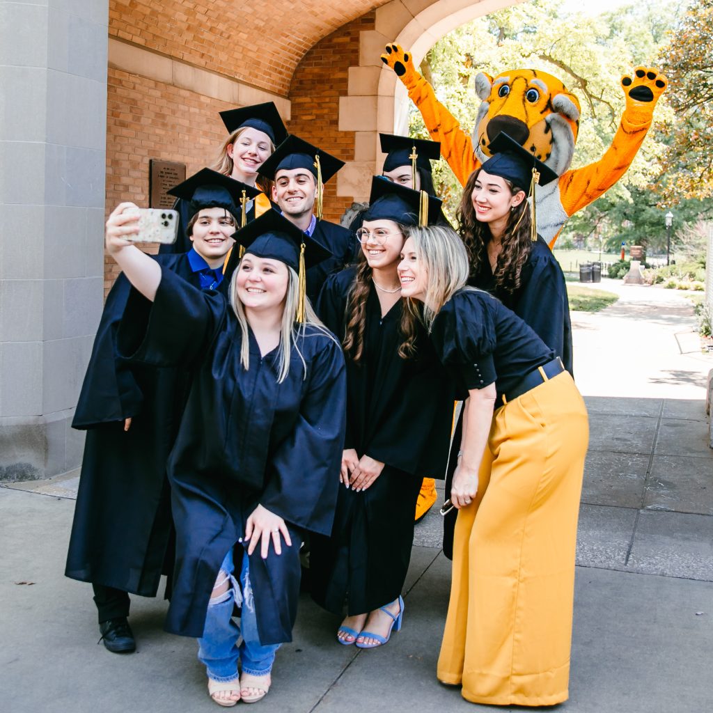 Mizzou Academy students posing for a selfie with Truman Tiger.